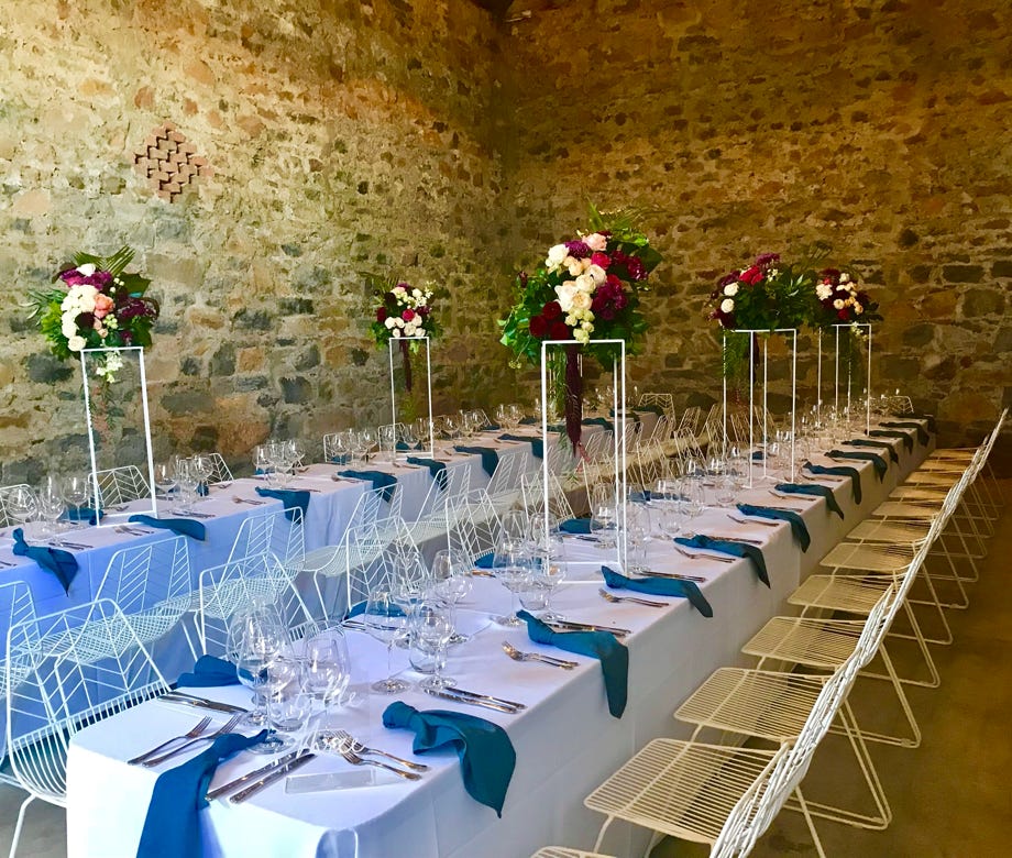 Waterton Hall - flower arrangements on long tables