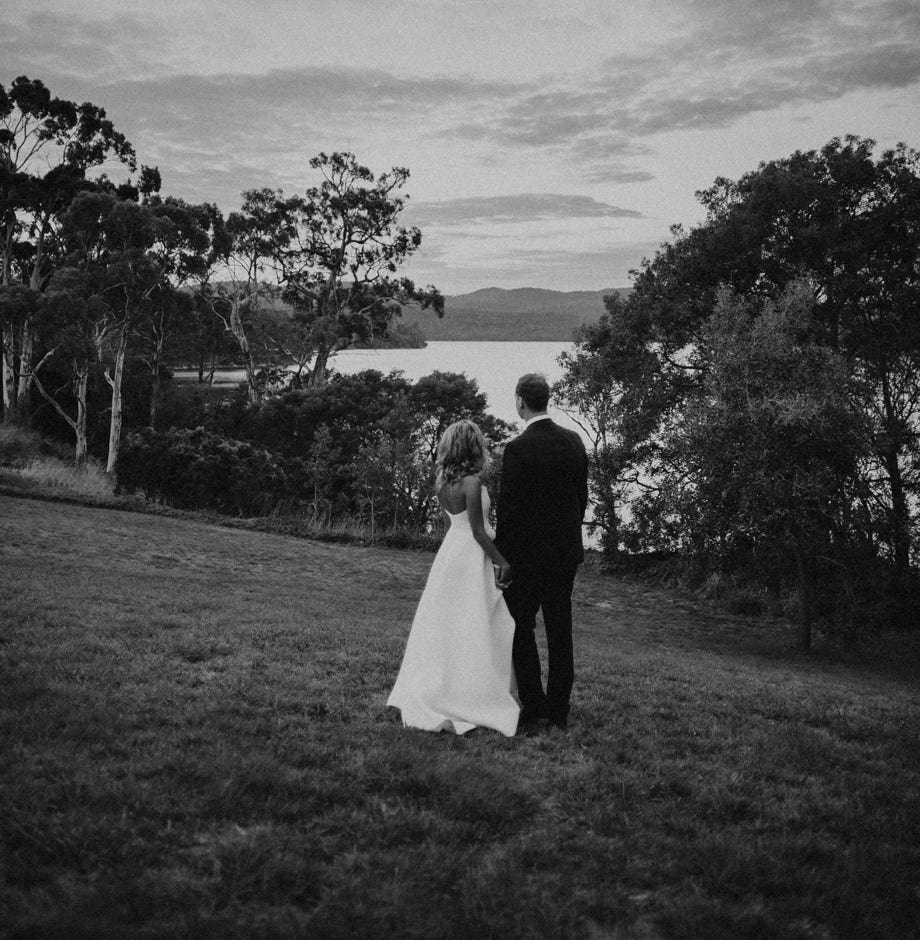 Waterton Hall - bride & groome overlooking the estate and Tamar River
