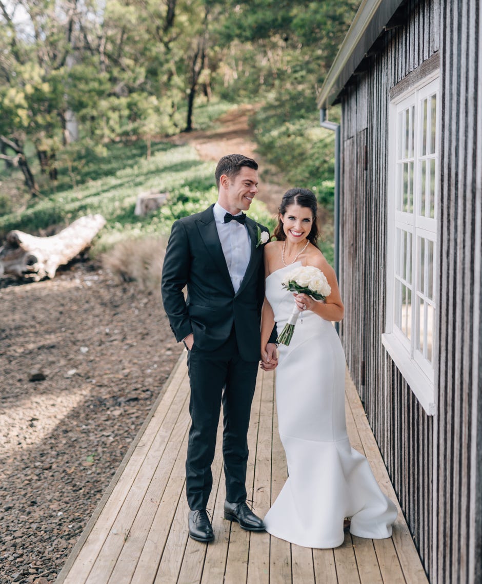 Waterton Hall - a beautiful shot of the bride and groom near the Tamar River... Photographer Clint & Bethanie