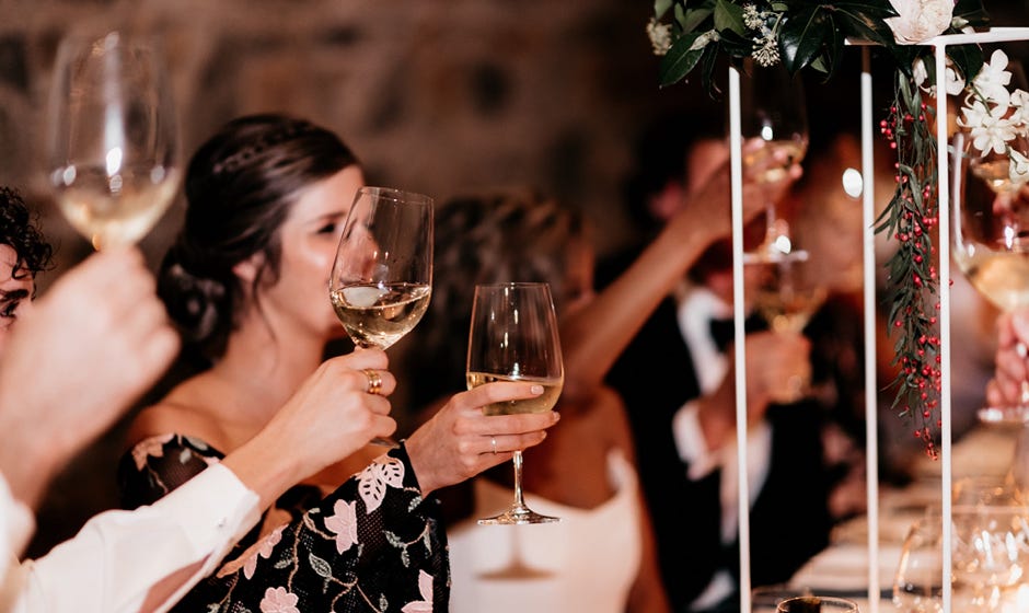 Waterton Hall - wedding table and guest toasting... Photographer Fiona Vail