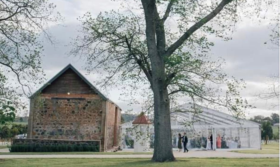 Wedding setup - marquee next to out Waterton Hall Barn